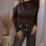 Top assimétrico mangas compridas