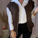 Casaco sem mangas com fecho